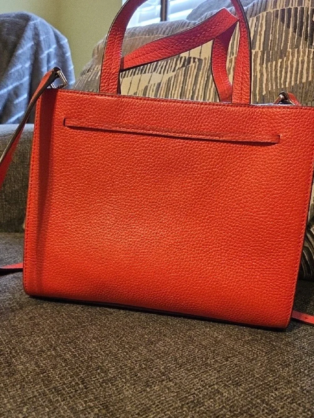 kate spade orange pebbled leather tote with tassel